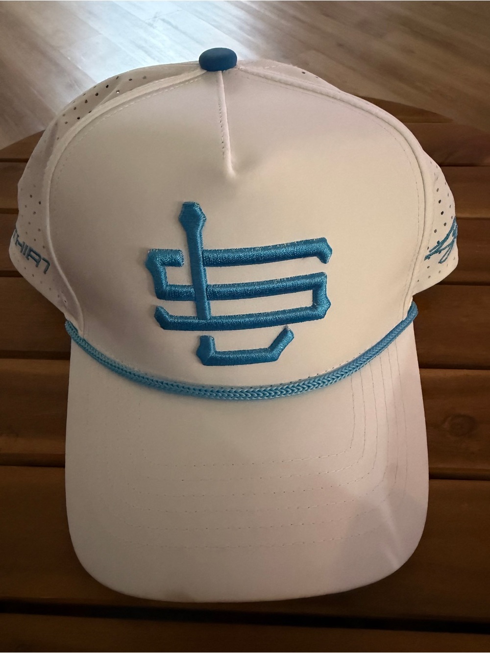 White Golf ⛳️ Cap with Turquoise Embroidered Logo